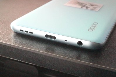 Speaker, UBC slot, mic, and headphone jack are placed at the bottom of OPPO A76