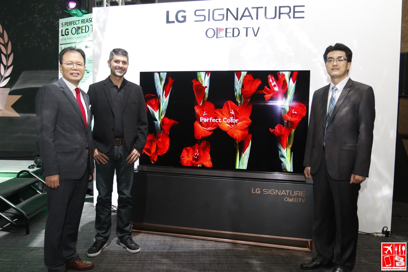 LG Electronics executives with James Deakin at the launch of the 77-inch LG Signature OLED TV