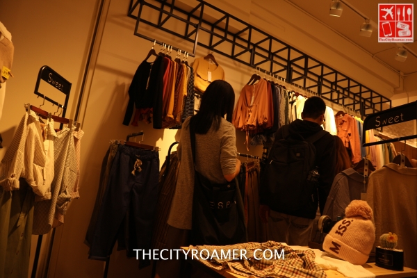 Checking out clothes at Shilin Night Market