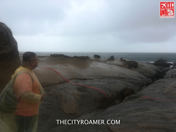 Looking at the ocean at Yehliu Geopark