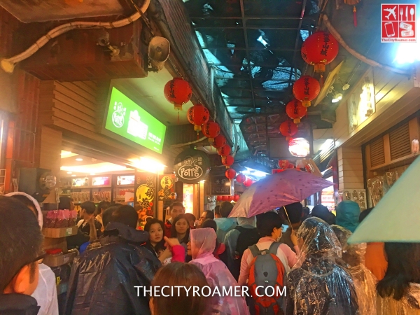 Tourist along the narrow Jiufen Old Street