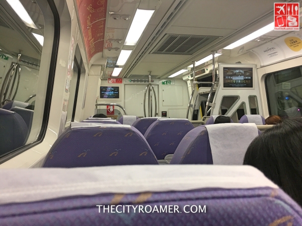 riding the airport MRT line_Fotor