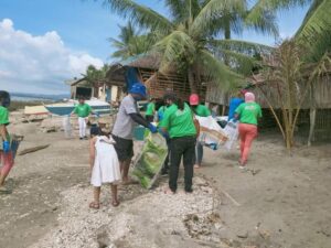 Bags of trash are picked up during the coastal cleanup