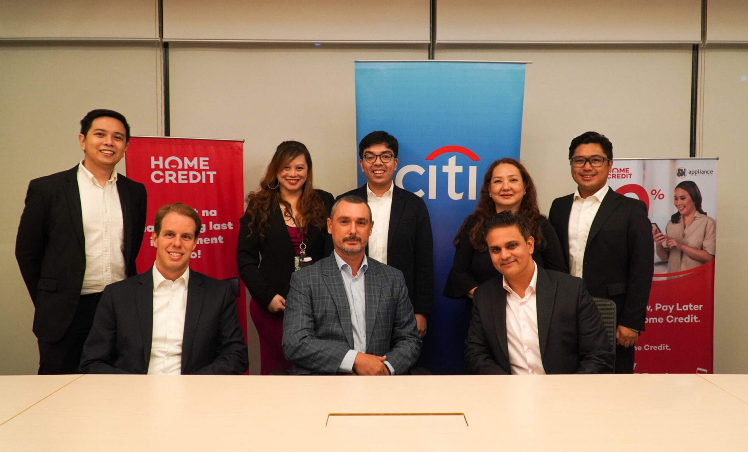Home Credit and Citi executives present for the signing of the social financing facility loan