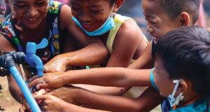Kids washing their hands at the GK ICD Village in Bagac Bataan