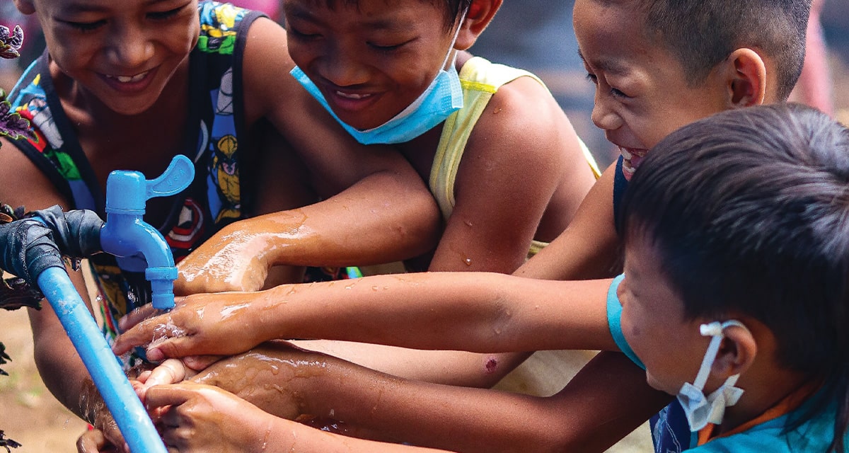 Kids washing their hands at the GK ICD Village in Bagac Bataan