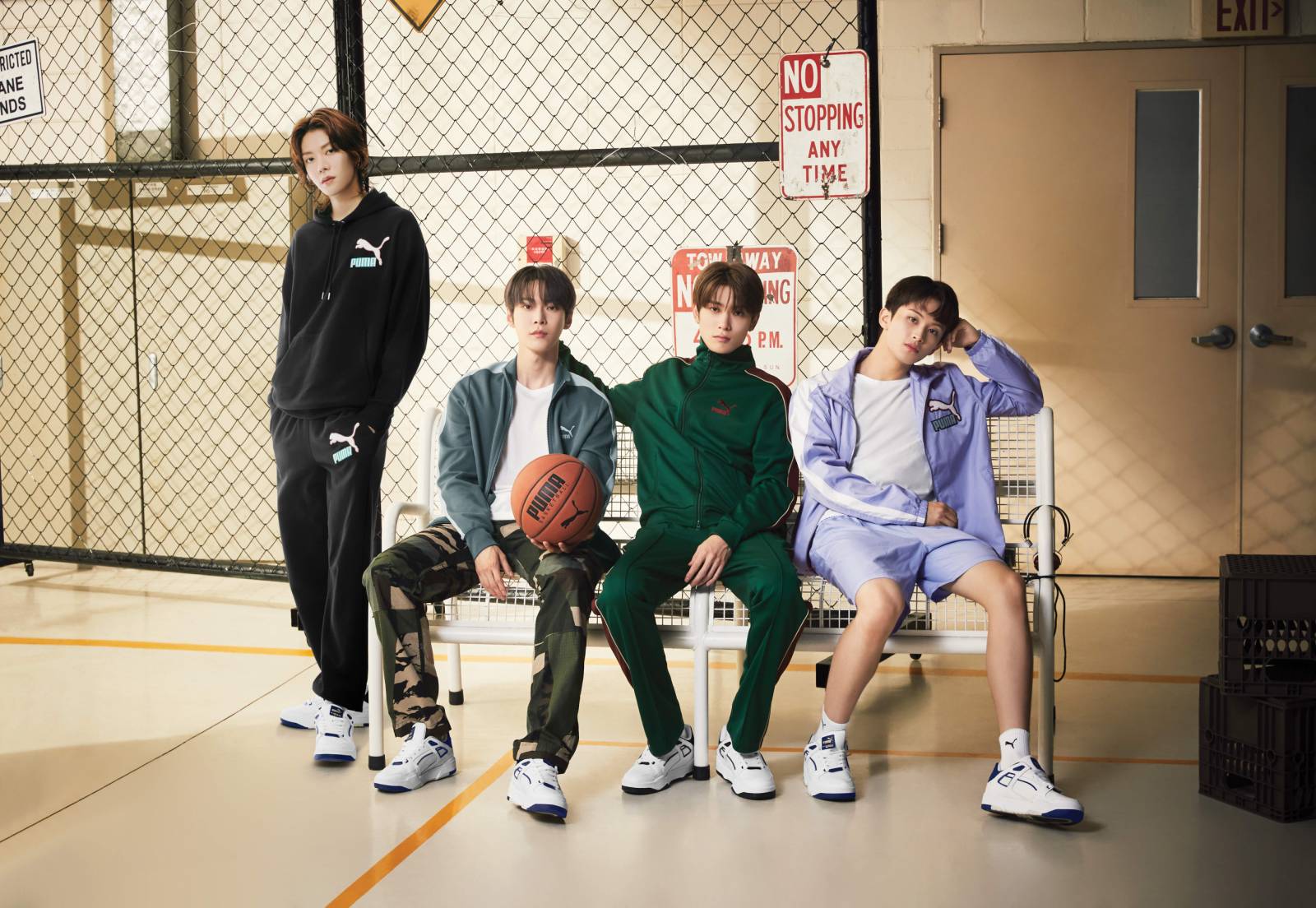 Some of the NCT127 members wearing the PUMA SLIPSTREAM sneakers